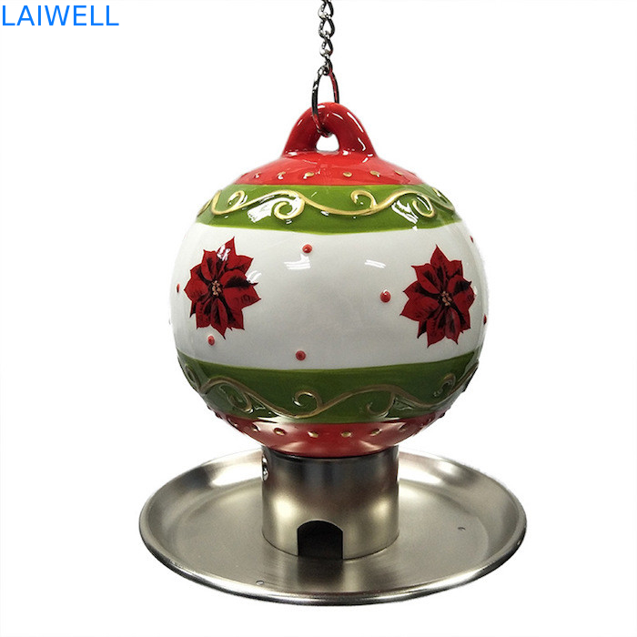Alimentatore ceramico all'aperto dell'uccello del metallo della palla di Natale con il piatto di timbratura placcato dell'alimento del ferro