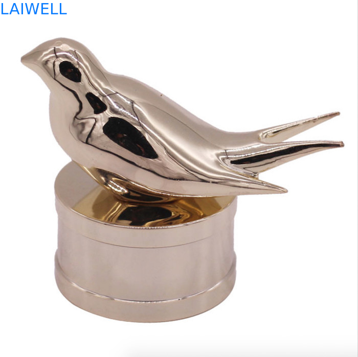 Tappi per flaconi di profumo in lega di zinco moderni e alla moda con design personalizzato a forma di uccello per fragranze di alta gamma